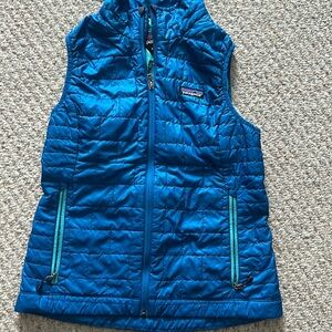 Patagonia is Women’s Nano vest. Size small